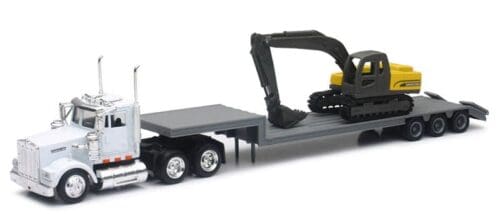 A toy truck with a trailer and a backhoe.
