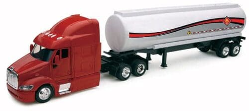 A toy semi truck with a trailer on the back.