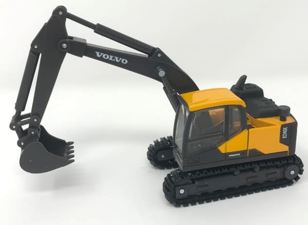 A toy excavator is on the floor.