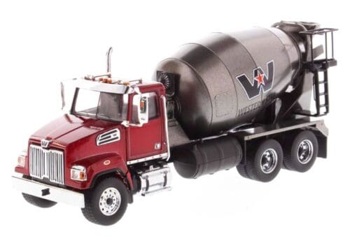 A red truck with cement mixer on the back.