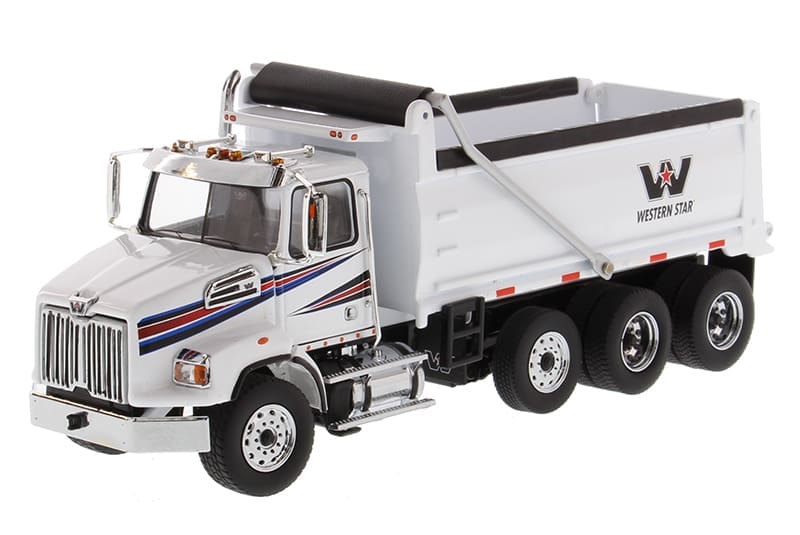 A white dump truck with the words " v-1 2 " on it.