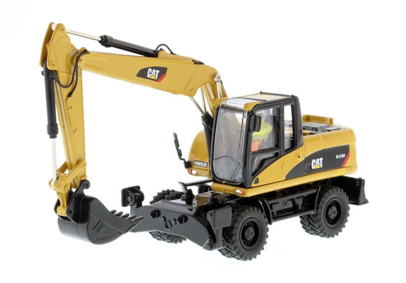 A yellow and black cat construction vehicle with a large shovel.
