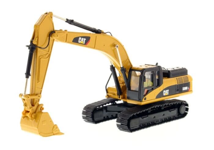 A yellow and black cat excavator is on display.