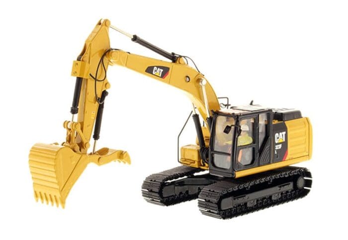 A yellow and black cat excavator with a large claw.