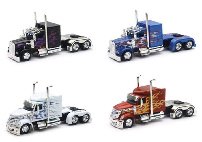 A set of four toy trucks with different colors.