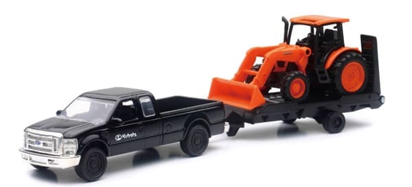 A toy truck and tractor on a white background
