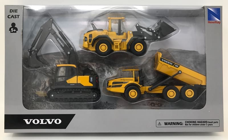 A set of three construction vehicles in packaging.