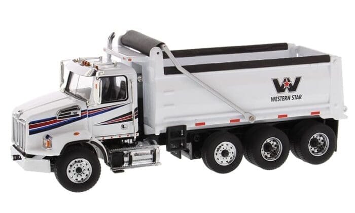 A white dump truck with the words " v-net " on it.