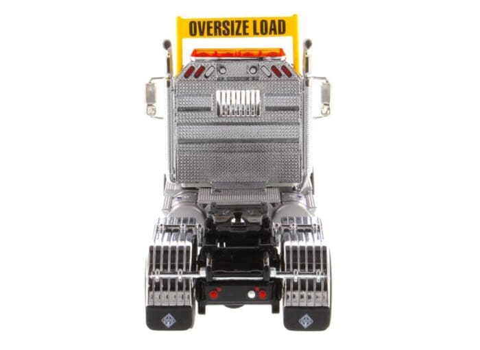 A large truck with the words " oversize load ".