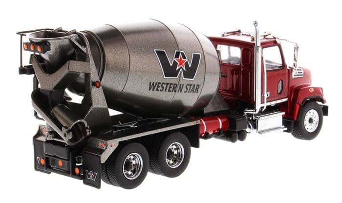 A cement truck with the western star logo on it.