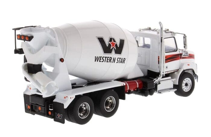A white cement truck with the name " western star ".