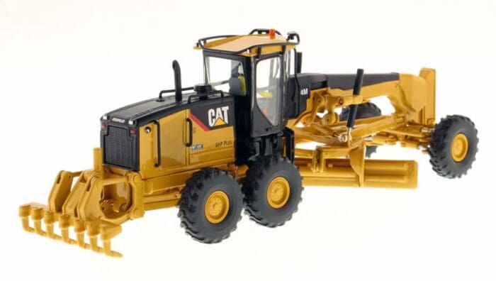 A yellow and black cat tractor is on the ground