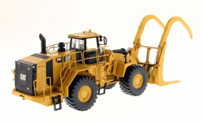 A yellow cat 9 8 0 k wheel loader with a large front end.