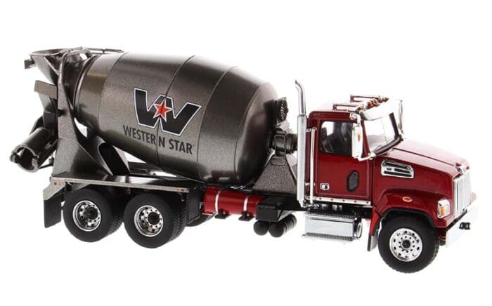 A cement truck with the western star logo on it.