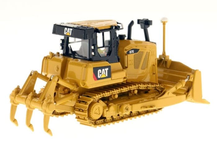 A cat bulldozer is shown with the cab open.