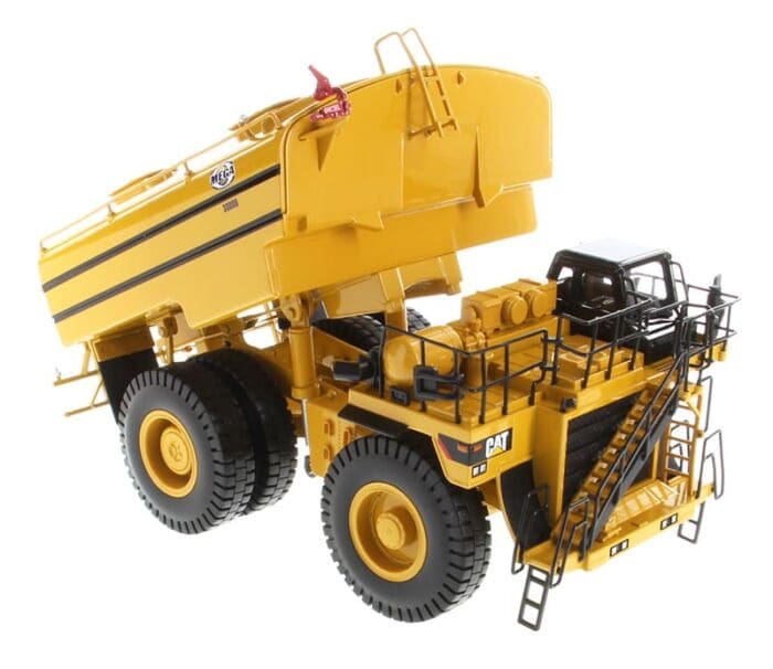 A yellow dump truck with a large bucket.