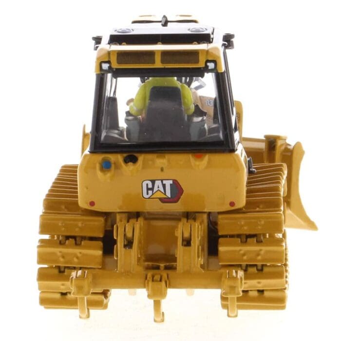 A yellow cat bulldozer with a black cab and plow.