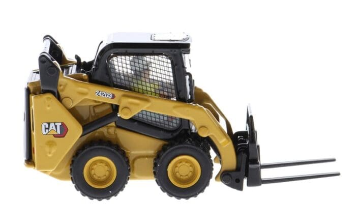 A toy cat skid steer with a cage on the back.
