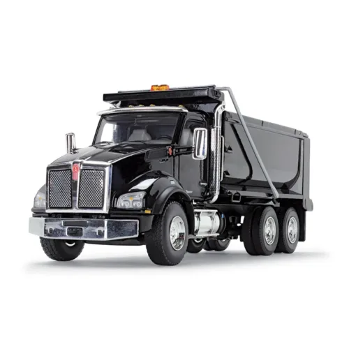 A black dump truck is parked on the road.