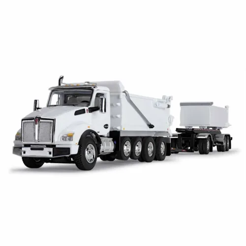 A white dump truck with a trailer attached.