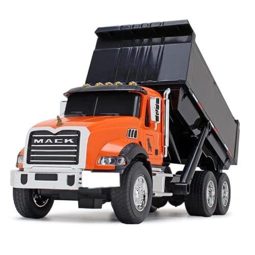 A toy dump truck is orange and black.