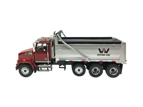A red dump truck with a silver trailer.