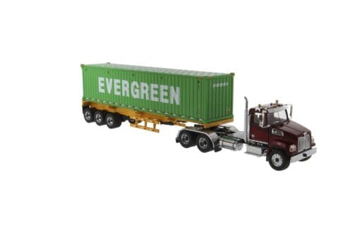 A semi truck with a trailer hauling a large container.
