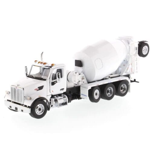 A white truck with a cement mixer on the back.