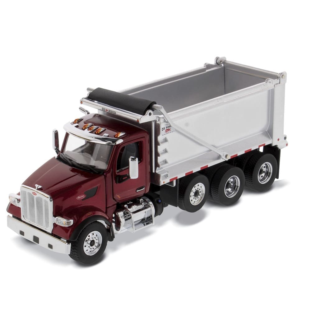 A red dump truck with a white trailer.