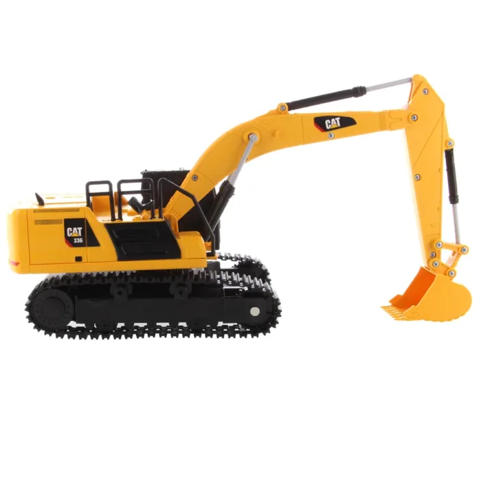 A yellow and black toy excavator is on the ground.