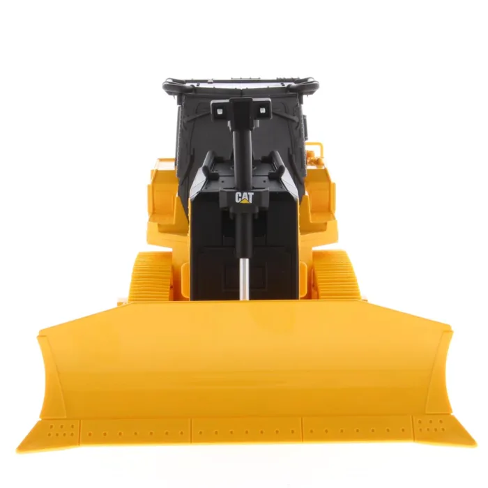 A yellow and black toy bulldozer is on the floor.
