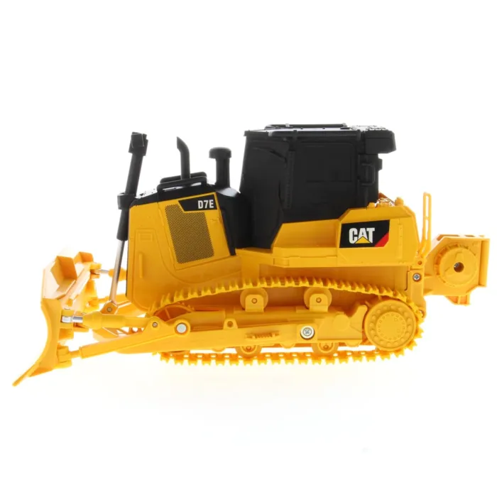 A yellow and black cat bulldozer is on the ground.