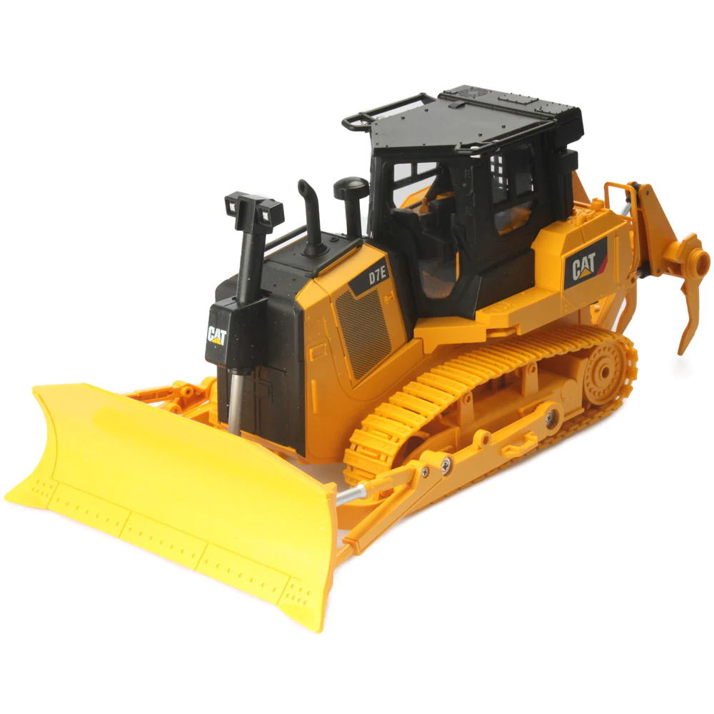 A toy cat bulldozer with a yellow plow.