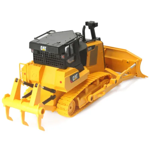 A yellow cat bulldozer with a black cab.