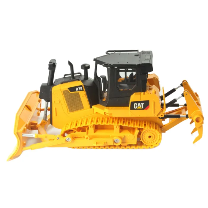 A yellow and black cat bulldozer with a plow blade.