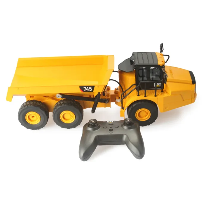 A remote control dump truck is shown with the front end open.