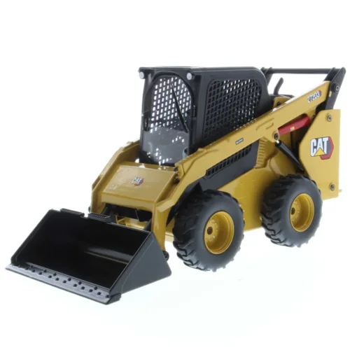A toy cat skid steer with bucket on the front.