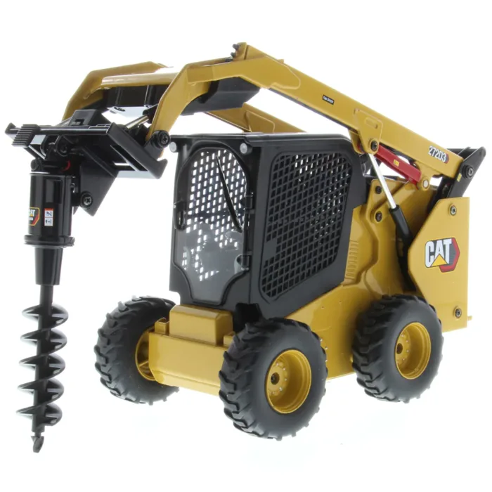 A toy cat skid steer with a bit attached to it.
