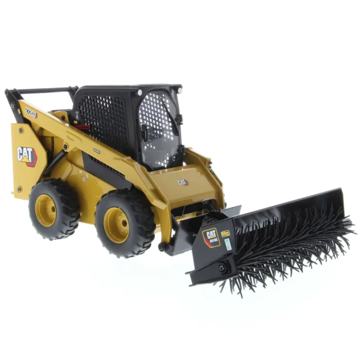 A yellow and black tractor with a brush attachment.
