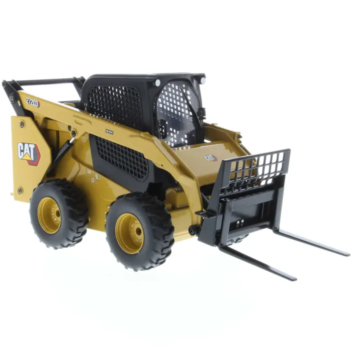 A cat skid steer with forks on the back.