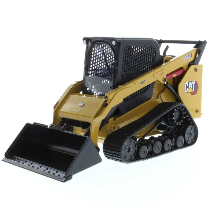 A cat mini track loader with bucket and tracks.