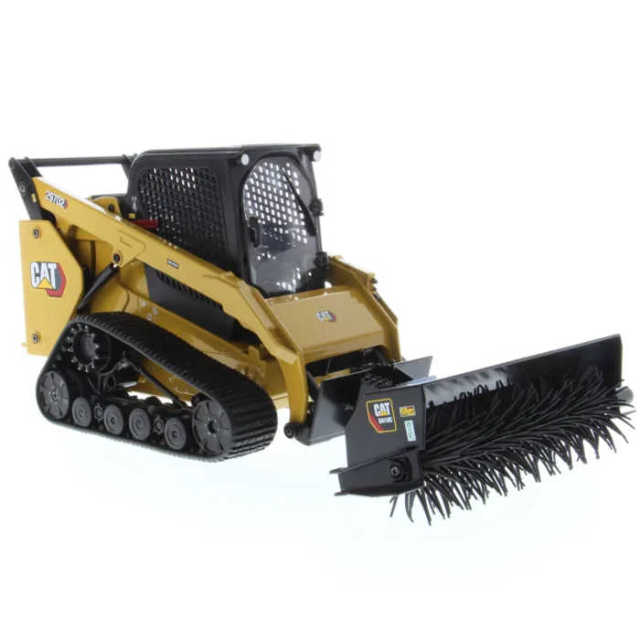 A yellow and black cat with a brush attachment.